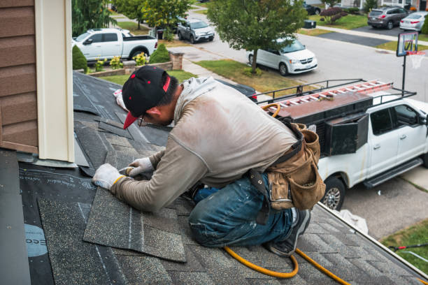Professional Gutter Repair And Installation technician working in North Reading, MA